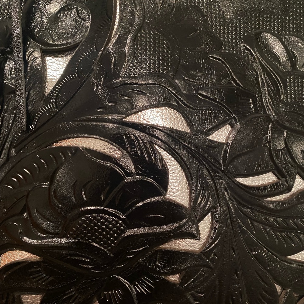Patricia Nash purse. Black tooled leather. Great condition.